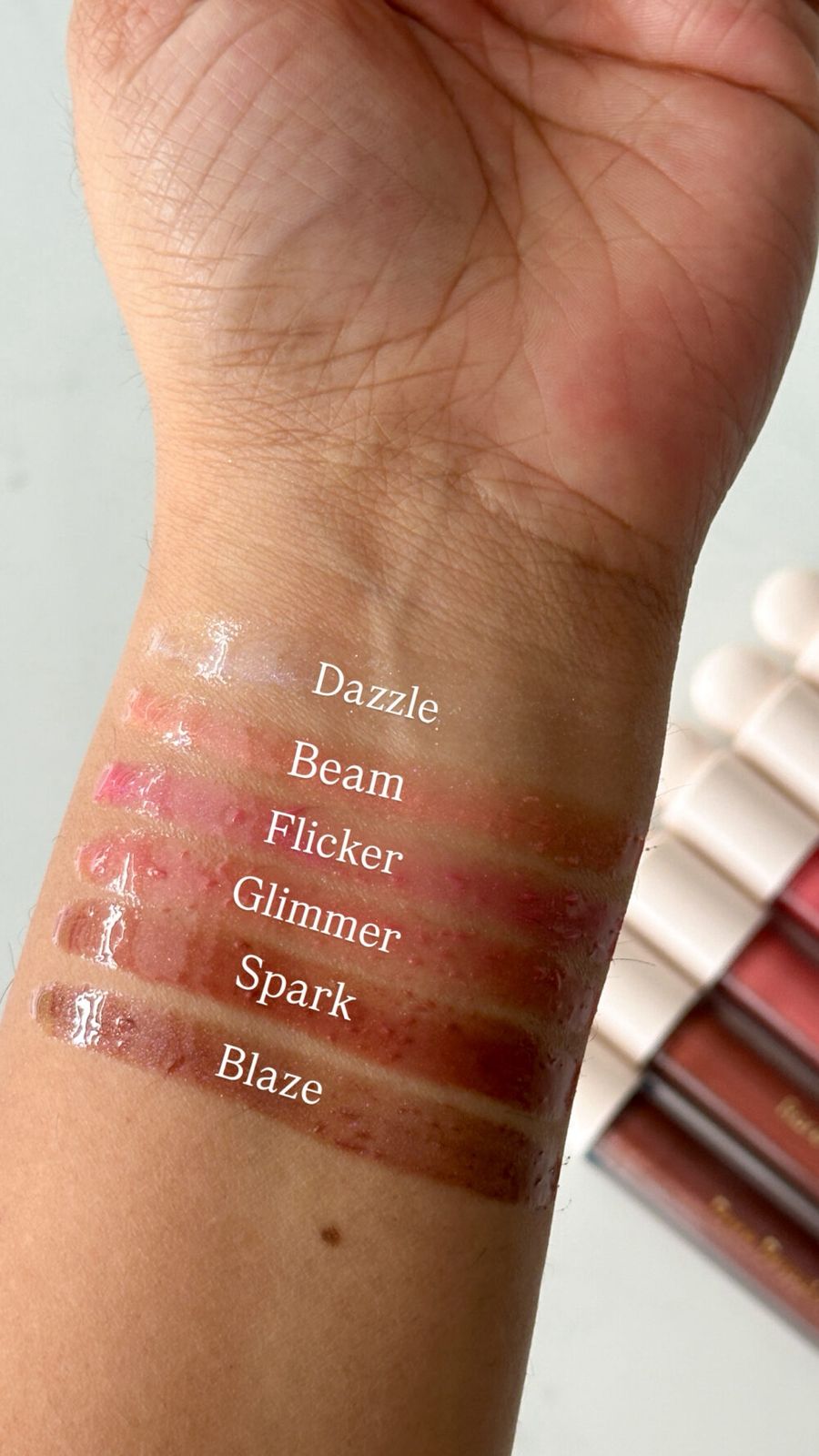 Rare beauty lip glaze positive light